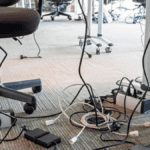 tangled cables in office space illustrating poor organization prior to teamwork training
