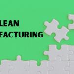 training in lean – Lean Manufacturing concept with puzzle pieces on green background representing structured process improvement