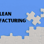 Lean process – puzzle illustration with “Lean Manufacturing” text on a blue background.