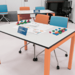 Lean training station setup with colorful elements and visual instructions for Training Lean Management.