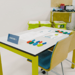 Hands-on activity during a workshop using colorful blocks in one of the free Lean games.