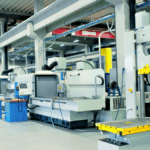 Bright, well-organized factory hall used for a lean training program.
