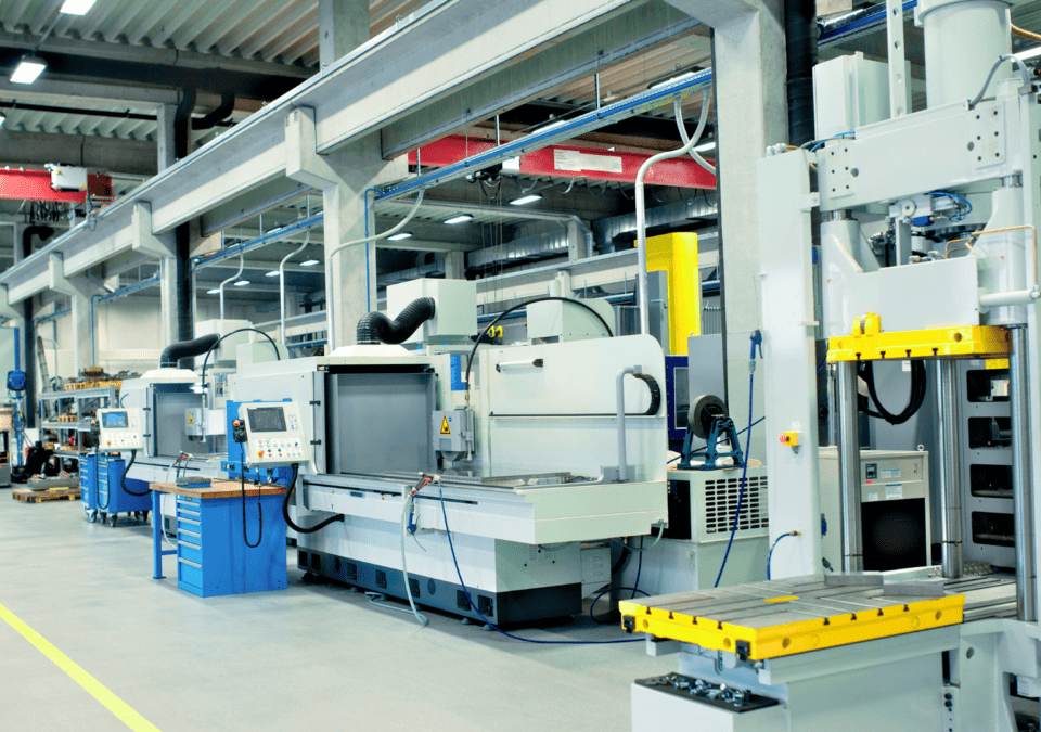 Bright, well-organized factory hall used for a lean training program.
