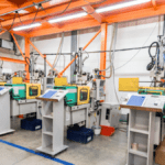 Compact injection-moulding workcells with operator stations arranged according to Lean Operations Principles