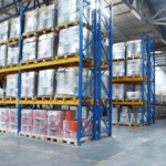 High-bay warehouse showing pallet racks organised according to the Principles of Lean Manufacturing
