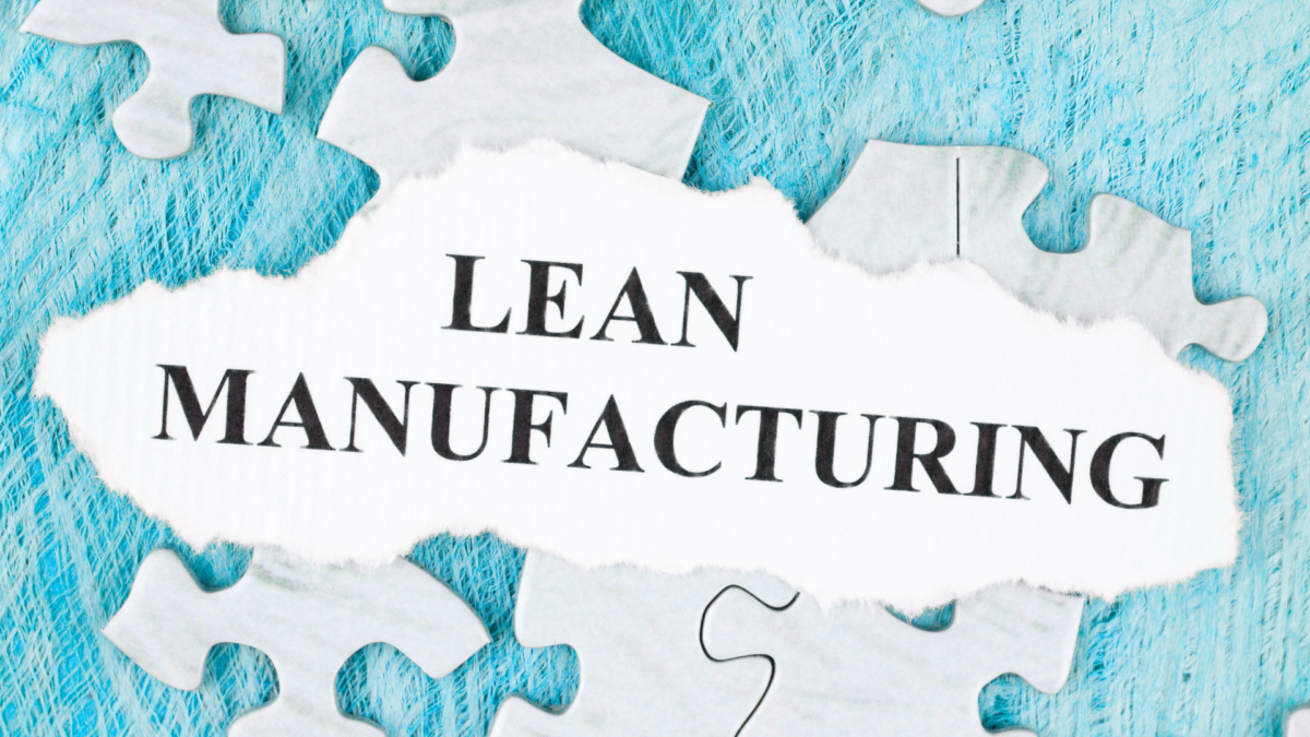 Puzzle with torn paper displaying "Lean Manufacturing" as part of 5S Lean Production. 