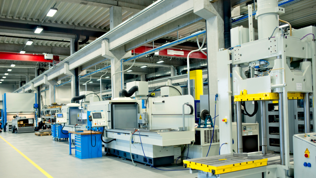 Advanced manufacturing facility demonstrating principles of lean 5S Six Sigma with clean, structured layout and modern equipment.