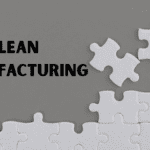 Lean Management Lean Production puzzle with one missing piece beside the title “Lean Manufacturing.”