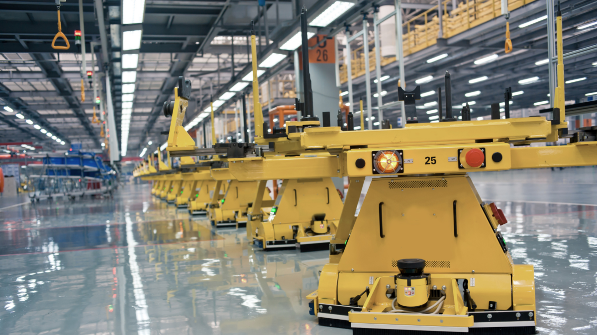 Automated guided vehicles in a Lean production line demonstrating What Is Lean in Business.