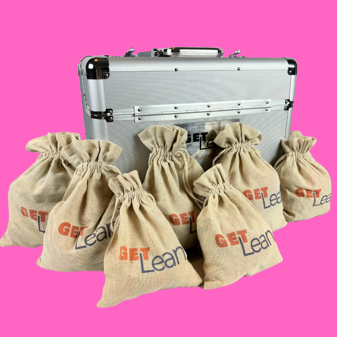 "Lean games for workshops – simulation training kit with Get Lean bags and silver case on pink background"